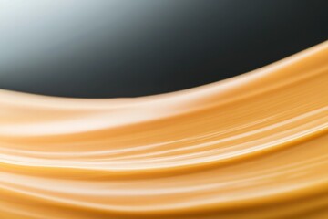 Soft, flowing fabric in warm tones creates serene, elegant atmos