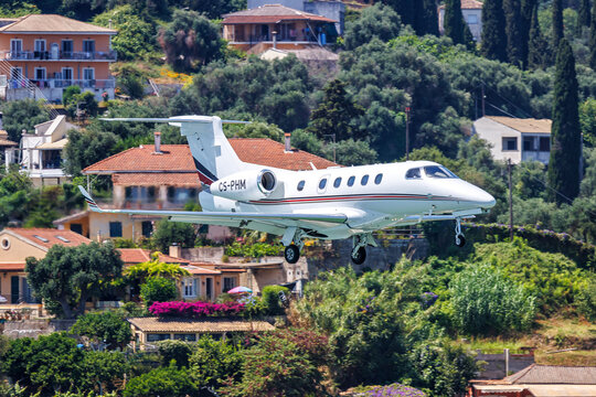 NetJets Europe Embraer 505 Phenom 300 airplane at Corfu Airport in Greece