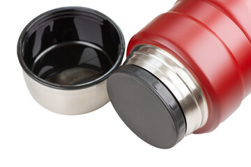 Red thermos for food and drink isolated on white background. Thermal dishes for hot breakfasts and lunches.