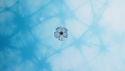 A dreamy watercolor scene featuring abstract blue patterns on textured paper