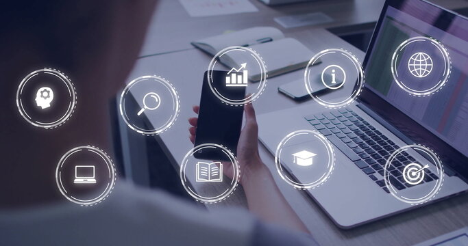 Image of digital icons and data processing over caucasian businesswoman using smartphone - Powered by Adobe