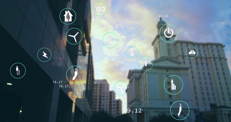 Image of network of eco icons over cityscape