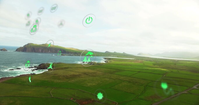 Image of network of eco icons over seascape - Powered by Adobe