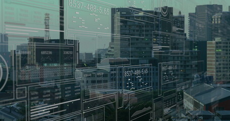 Image of financial data processing over cityscape