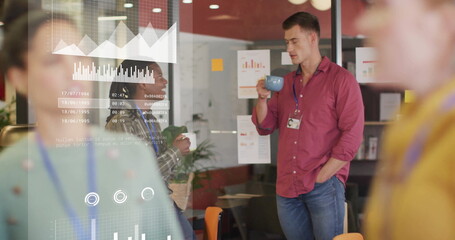 Image of data processing and diagrams over diverse business people at meeting