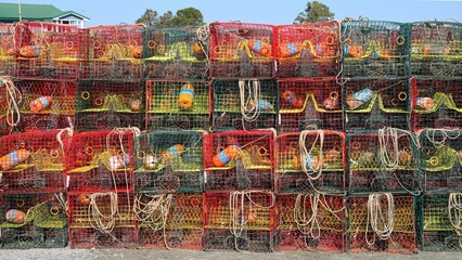 Vibrant lobster traps at a harbor.