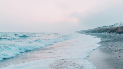 Naklejka premium Serene coastal sunrise, gentle waves lapping sandy shore, misty background, travel brochure