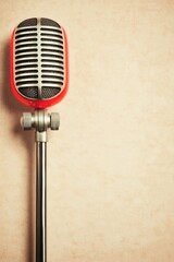 Fototapeta premium vintage retro microphone in red and silver design.