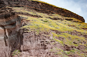 Geology outcrops. Volcanic rock nature. Rock formation with erosion. Landscape with rock formation. Nature formation. Geological rock formation. Tourism and travel destination, Greece