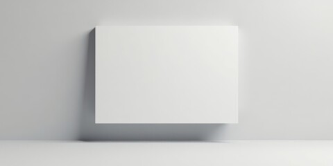 Blank Square Canvas on a Light Grey Wall, Ready for Your Design or Artwork Presentation