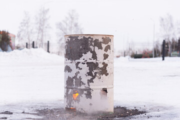 The fire barrel was badly burnt by the high temperature.