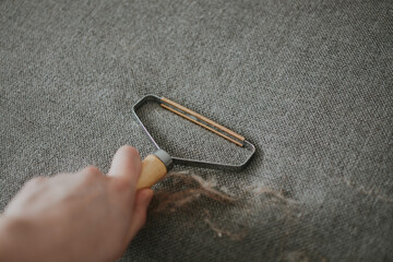 Close-up of a brush-scraper for removing hair