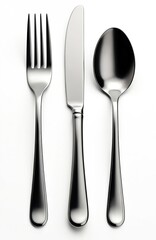 Elegant stainless steel cutlery set with fork, knife, spoon. Shiny tableware for dining, modern design, essential utensil for formal meal, polished craftsmanship isolated on white.