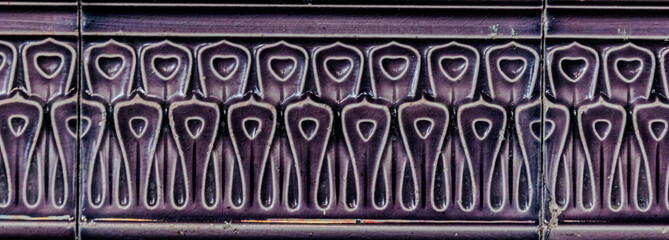 Old tiles. Vintage ceramic tile with floral pattern