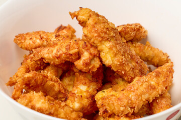 chicken croquettes in a bowl on a table