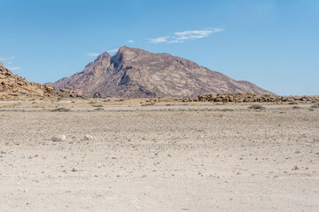 granite inselberg mountain in desert, Klein Spitzkoppe, Namibia