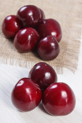 Fresh ripe cherries on jute cloth. Healthy dessert or snack