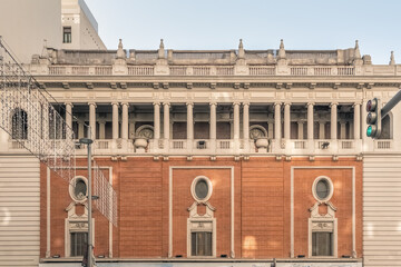 Obraz premium Iconic Gran Via 35 Building, known as Palacio de la Musica, was designed by Secundino Zuazo Ugalde in 1926, Spain. This historic structure features classical columns and an ornate facade
