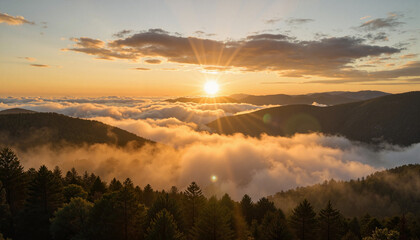 Fototapeta premium Ethereal sunrise over misty mountains with golden rays, natural serenity