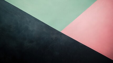 Textured black backdrop adorned in light green and pink hues; transitions from rough texture at the top to sleek finish below
