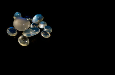 Blue moonstones on black
