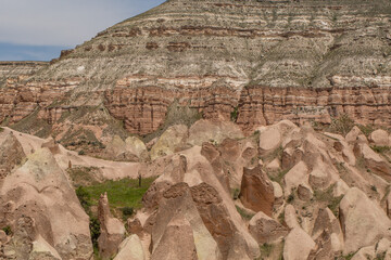 Cappadocia’s colorful rock formations, shaped by wind and water erosion, create a surreal landscape. Layers of volcanic rock reveal history, while valleys and cliffs form an awe-inspiring natural wond