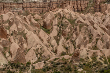 Cappadocia’s colorful rock formations, shaped by wind and water erosion, create a surreal landscape. Layers of volcanic rock reveal history, while valleys and cliffs form an awe-inspiring natural wond