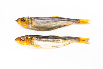 Hot smoked whole herrings on kitchen table. smoked fish isolated on white