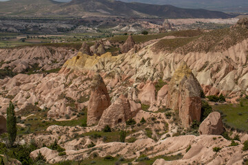 Cappadocia’s colorful rock formations, shaped by wind and water erosion, create a surreal landscape. Layers of volcanic rock reveal history, while valleys and cliffs form an awe-inspiring natural wond