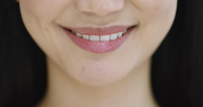 Close up cropped view lower face parts of diverse multiracial cheerful people smiling revealing white teeth, advertising professional dental clinic services, feel satisfied after procedure, exude joy