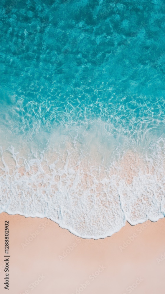 Aufkleber aerial view of crystal clear turquoise water creating white foam waves gently washing up on a pristi