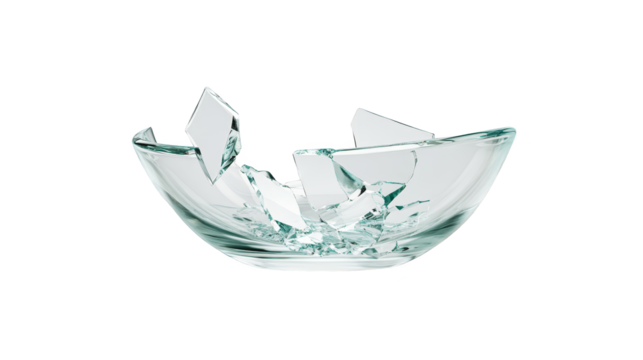 Shattered glass fragments on a checkered tablecloth, still life capturing the aftermath of mishap