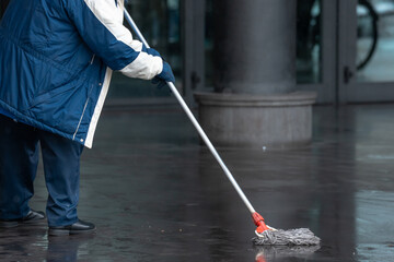 Workers Cleaning Cultural Sites Outdoors