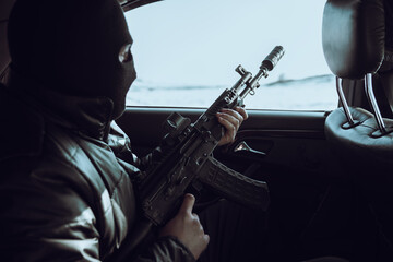 Criminal Using Weapon to Rob Civilians