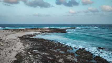 Dusk at Socotra Island stunning coastline with blue waters and rocky formations