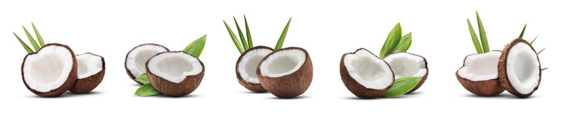 Coconuts and green leaves isolated on white, set
