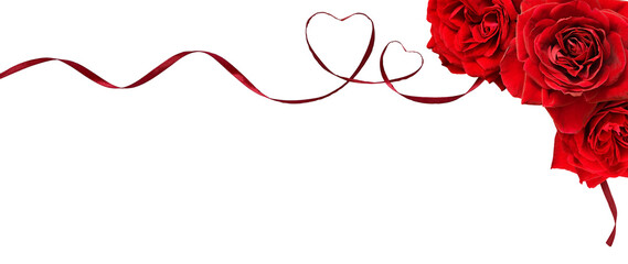 Red rose flowers in a corner arrangement with satin ribbon with hearts isolated on white or...