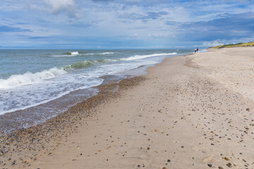 Strolling along the beach  on the Danish North Sea coast