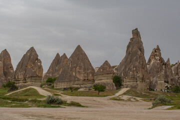 Cappadocia’s colorful rock formations, shaped by wind and water erosion, create a surreal landscape. Layers of volcanic rock reveal history, while valleys and cliffs form an awe-inspiring natural wond