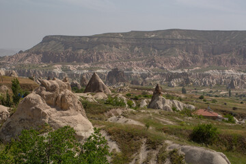 Cappadocia’s colorful rock formations, shaped by wind and water erosion, create a surreal landscape. Layers of volcanic rock reveal history, while valleys and cliffs form an awe-inspiring natural wond