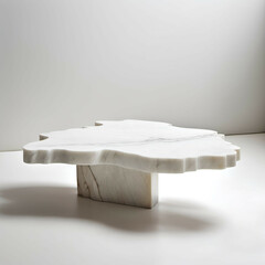 Asymmetrical Marble Coffee Table: A slab of natural white marble with an irregular, minimalist base.