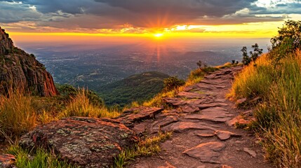 Hiking trail overlooking city at sunset in mount lofty ranges, south australia