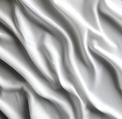 Fototapeta premium soft fabric with wavy folds. It is white in color and looks smooth and silky.