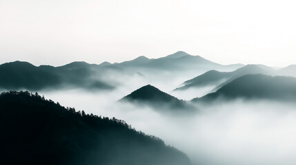 Fototapeta premium Early morning landscape. Foggy. River valley in the morning fog at sunrise. View from above. Rays of the sun breaking through the fog in over the trees. Athmosphere quite and calm
