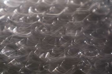 Abstract White Light Motion of Water Flowing for Background and Overlay