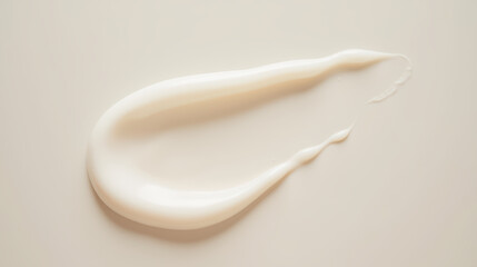 Creamy texture of skincare product on smooth surface, evoking sense of luxury and nourishment