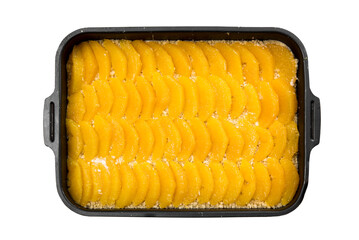 Pie with a sandy crumb with oranges in a forming form