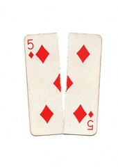 A vintage playing card torn in half from top to bottom on a white background.