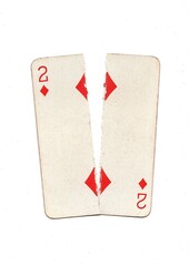 A vintage playing card torn in half from top to bottom on a white background.