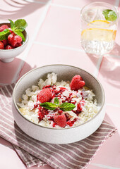 cottage cheese with raspberries and almond petals